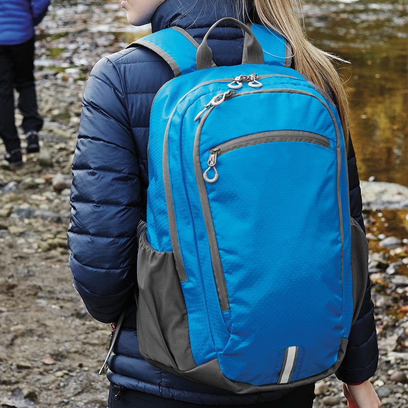 Woman carrying Backpack